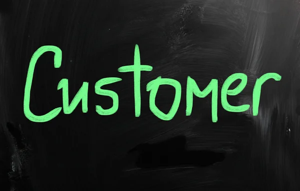 "customer" handwritten with white chalk on a blackboard — Stock Photo, Image