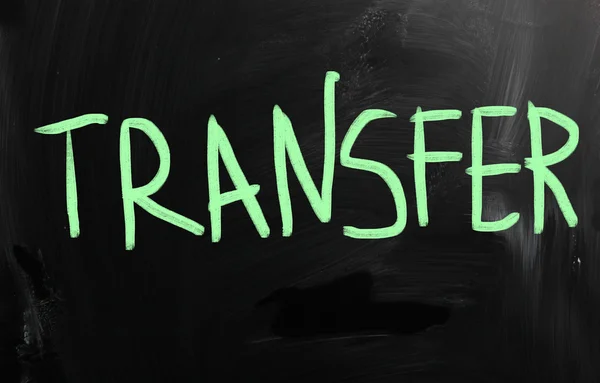 "Transfer "handwritten with white chalk on a blackboard — стоковое фото
