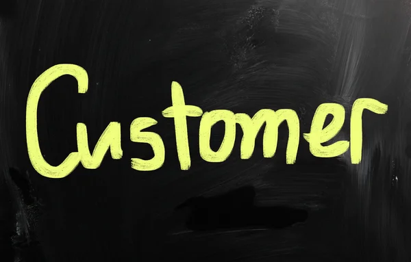 "customer" handwritten with white chalk on a blackboard — Stock Photo, Image