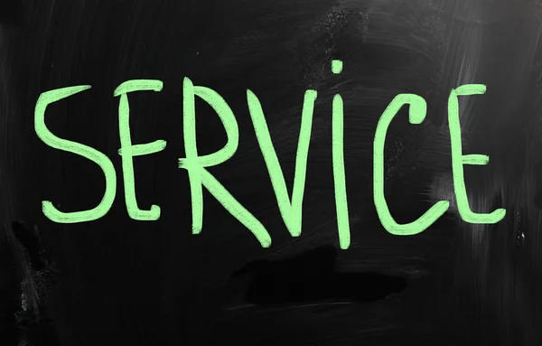 "service" handwritten with white chalk on a blackboard — Stock Photo, Image