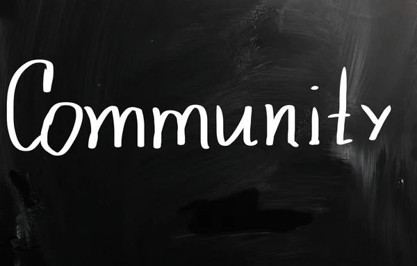 "Community "handskriven med vit krita på en svart tavla — Stockfoto
