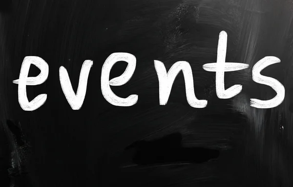 "Events" handwritten with white chalk on a blackboard — Stock Photo, Image