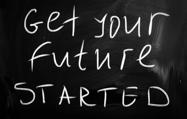 "Get your future started "handwritten with white chalk on a blac — стоковое фото