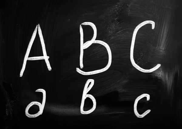 Tekst met de hand geschreven met wit krijt op een schoolbord — Stockfoto
