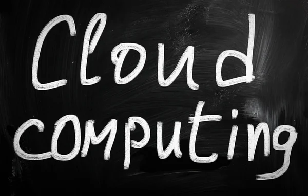 "Cloud computing "handwritten with white chalk on a blackboard — стоковое фото