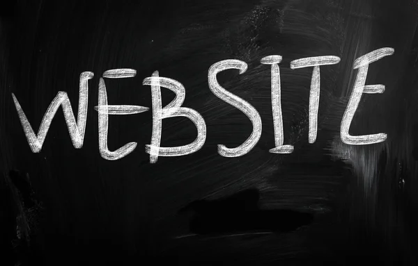 "Website" handwritten with white chalk on a blackboard — Stock Photo, Image