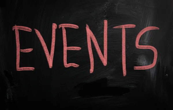 "Events" handwritten with white chalk on a blackboard — Stock Photo, Image