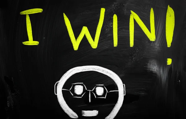"Win "handgeschreven met wit krijt op een Blackboard — Stockfoto