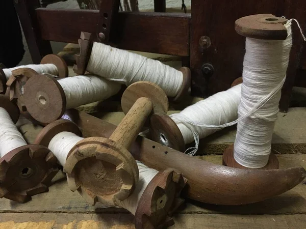 Spinning Wheel For Making Yarn From Wool Fibers. Vintage Rustic Equipment, Stock image