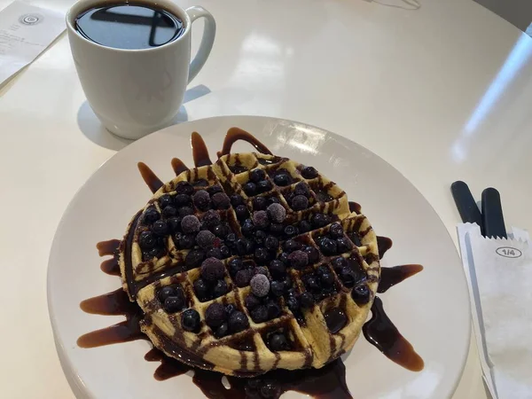 Blueberry Waffles Chocolate Syrup White Dish Ready Breakfast — Photo