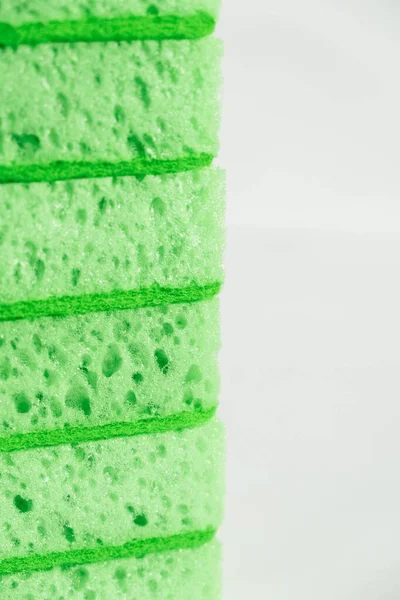 Green Sponges Cleaning White Background — стоковое фото