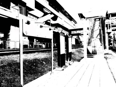 Tren istasyonunun manzarası ve tren istasyonunu birbirine bağlayan üstgeçit..