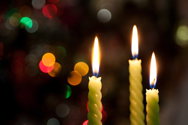 Three candle on bokeh