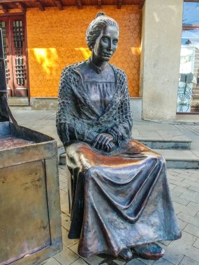 İspanya 'nın Kanarya Adaları' ndaki Gran Kanarya Adası 'ndaki Moya köyünün ana caddesindeki sokak satıcılarına hürmeten heykel