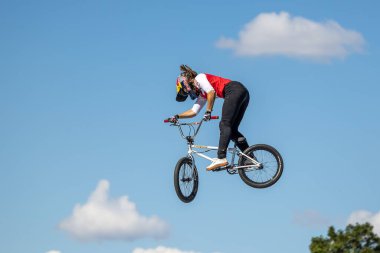 Munich, Germany - Aug 12, 2022: Riders compete at the BMX Freestyle European Championsships at Olympiapark in Munich, Germany. Men's qualifiacation