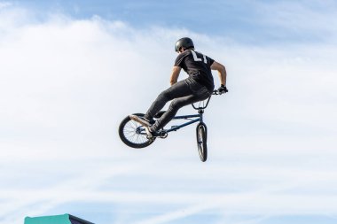 Munich, Germany - Aug 11, 2022: Riders compete at the BMX Freestyle European Championsships at Olympiapark in Munich, Germany. Men's qualifiacation