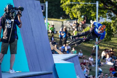 Munich, Germany - Aug 11, 2022: Riders compete at the BMX Freestyle European Championsships at Olympiapark in Munich, Germany. Men's qualifiacation