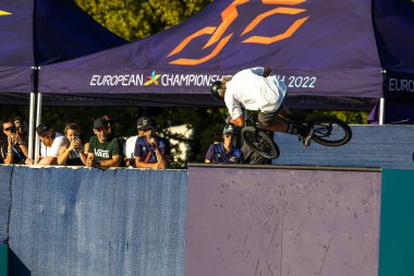 Munich, Germany - Aug 11, 2022: Riders compete at the BMX Freestyle European Championsships at Olympiapark in Munich, Germany. Men's qualifiacation