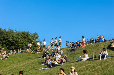 Munich, Germany - Aug 10, 2022: Alphorn player in action during the opening ceremony of the European Championships 2022 at Munich, Germany