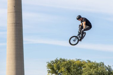 Munich, Germany - Aug 11, 2022: Riders compete at the BMX Freestyle European Championsships at Olympiapark in Munich, Germany. Men's qualifiacation
