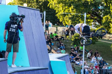Munich, Germany - Aug 11, 2022: Riders compete at the BMX Freestyle European Championsships at Olympiapark in Munich, Germany. Men's qualifiacation