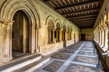 The cloister of Santo Domingo de Silos Abbey at Burgos, Spain. It is a Benedictine monastery and a masterpiece of Romanesque art.