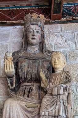 The cloister of Santo Domingo de Silos Abbey at Burgos, Spain. It is a Benedictine monastery and a masterpiece of Romanesque art.
