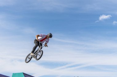 Munich, Germany - Aug 11, 2022: Riders compete at the BMX Freestyle European Championsships at Olympiapark in Munich, Germany. Men's qualifiacation