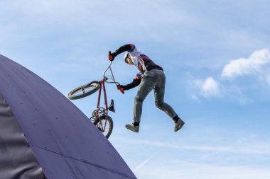 Munich, Germany - Aug 11, 2022: Riders compete at the BMX Freestyle European Championsships at Olympiapark in Munich, Germany. Men's qualifiacation