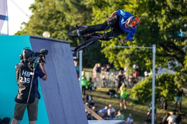 Munich, Germany - Aug 11, 2022: Riders compete at the BMX Freestyle European Championsships at Olympiapark in Munich, Germany. Men's qualifiacation