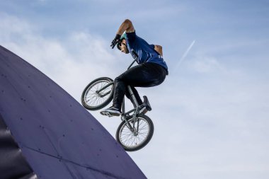 Munich, Germany - Aug 11, 2022: Riders compete at the BMX Freestyle European Championsships at Olympiapark in Munich, Germany. Men's qualifiacation