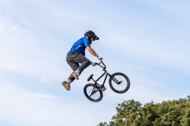 Munich, Germany - Aug 11, 2022: Riders compete at the BMX Freestyle European Championsships at Olympiapark in Munich, Germany. Men's qualifiacation