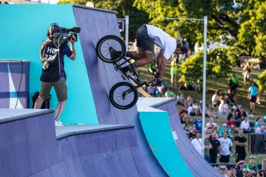 Munich, Germany - Aug 11, 2022: Riders compete at the BMX Freestyle European Championsships at Olympiapark in Munich, Germany. Men's qualifiacation