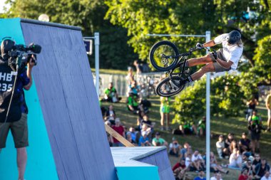 Munich, Germany - Aug 11, 2022: Riders compete at the BMX Freestyle European Championsships at Olympiapark in Munich, Germany. Men's qualifiacation