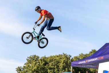 Munich, Germany - Aug 11, 2022: Riders compete at the BMX Freestyle European Championsships at Olympiapark in Munich, Germany. Men's qualifiacation