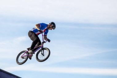 Munich, Germany - Aug 11, 2022: Riders compete at the BMX Freestyle European Championsships at Olympiapark in Munich, Germany. Men's qualifiacation