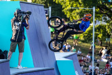 Munich, Germany - Aug 11, 2022: Riders compete at the BMX Freestyle European Championsships at Olympiapark in Munich, Germany. Men's qualifiacation