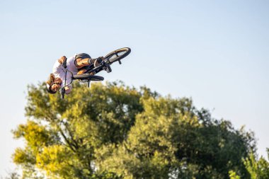 Munich, Germany - Aug 11, 2022: Riders compete at the BMX Freestyle European Championsships at Olympiapark in Munich, Germany. Men's qualifiacation