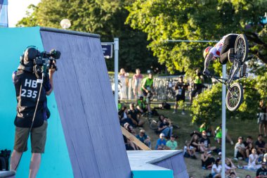 Munich, Germany - Aug 11, 2022: Riders compete at the BMX Freestyle European Championsships at Olympiapark in Munich, Germany. Men's qualifiacation