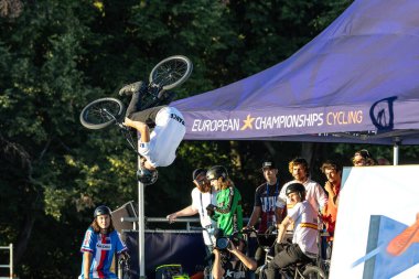Munich, Germany - Aug 11, 2022: Riders compete at the BMX Freestyle European Championsships at Olympiapark in Munich, Germany. Men's qualifiacation