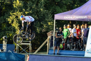Munich, Germany - Aug 11, 2022: Riders compete at the BMX Freestyle European Championsships at Olympiapark in Munich, Germany. Men's qualifiacation