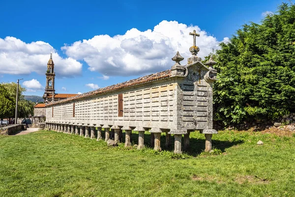 The long and narrow grain store, horreo at Carnota in Galicia, Spain. This particular horreo is claimed to be the region\'s largest complete and original example and it is nearly 35 metres in length.