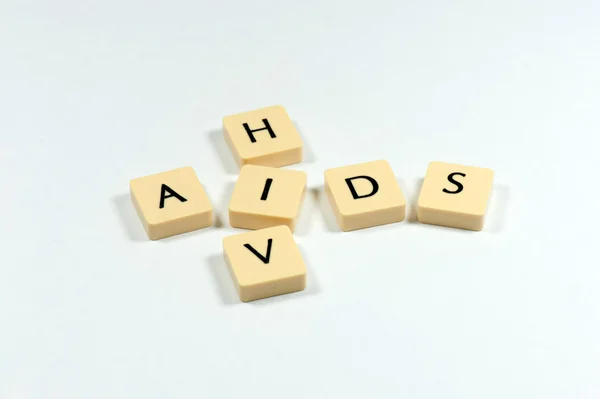 Letter cubes with word AIDS HIV — Stock Photo, Image