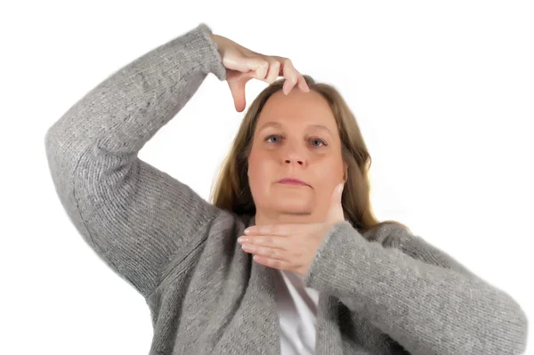 Woman is making frame with fingers — Stock Photo, Image