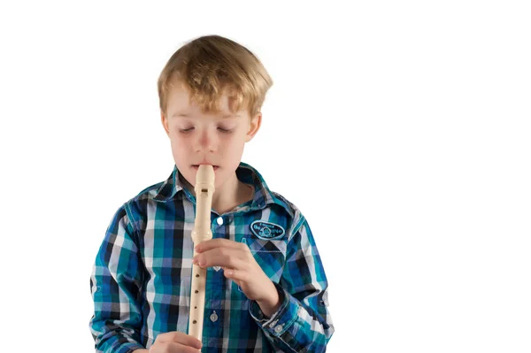 Niño tocando la flauta —  Fotos de Stock