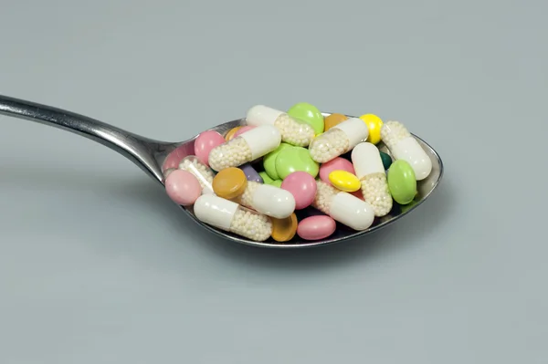 Medication on spoon — Stock Photo, Image