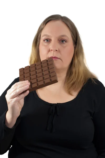 Mulher adora chocolate — Fotografia de Stock