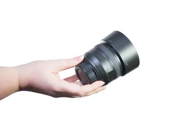 Camera lens in hand — Stock Photo, Image