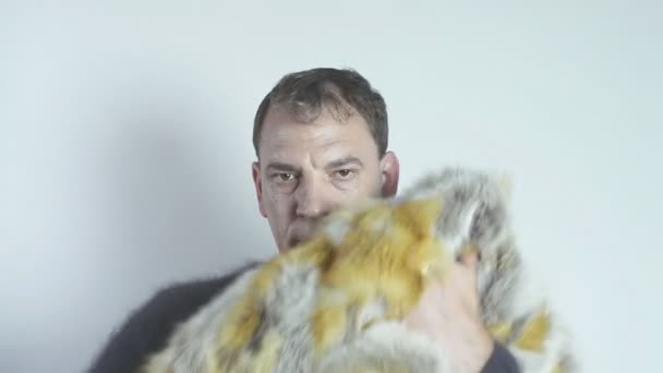 Man and fur coat — Stock Video