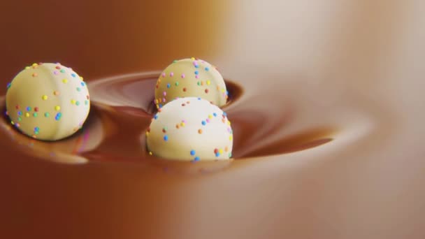 4k video di tre dolci in movimento nel cioccolato. — Video Stock